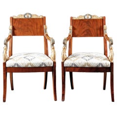 A Fine Pair of Russian Parcel Gilt Mahogany Armchairs
