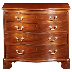 A Fine George III Serpentine Mahogany Chest