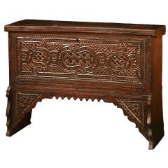 Antique Middle Eastern carved coffer on a stand