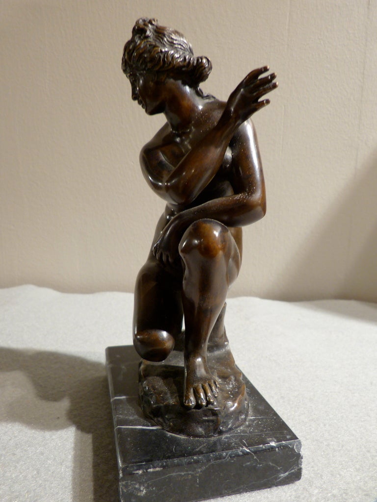 Classical Greek Bronze Aphrodite Seated at Her Bath For Sale