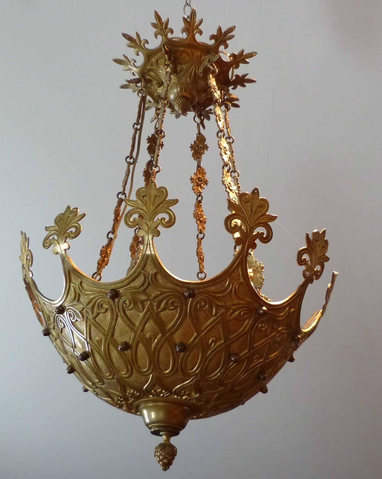 An unusual French late 19th century gilt bronze chandelier, probably for the Turkish market, now electrified. The style seems influenced by William Morris.