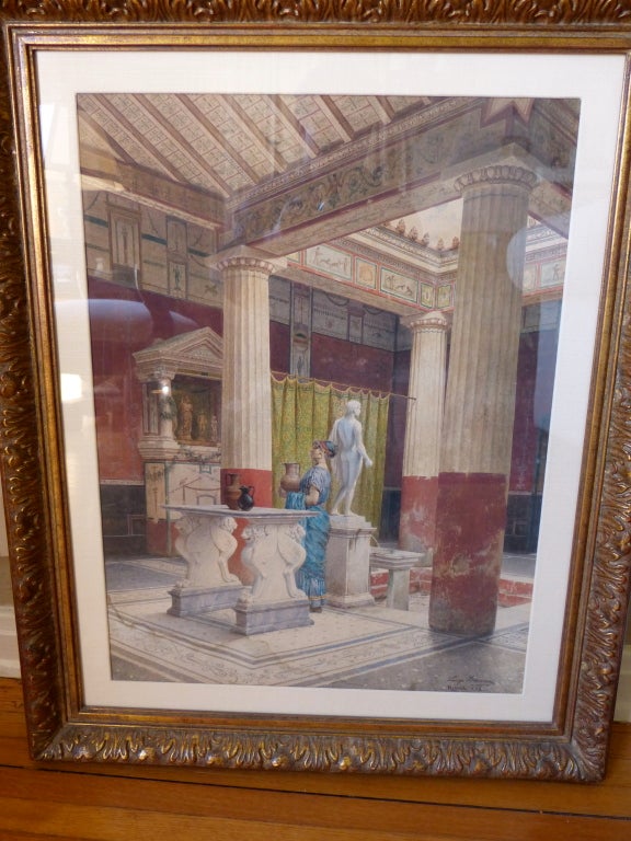 Watercolor signed and dated Luigi Bazzani Roma 1883. An interior of a Pompeiian house with columns frescoes and a marble table. The Los Angeles Museum publication of the Pompeii exhibition entitled 