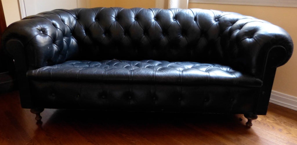 A good English late 19th century dark green leather Chesterfield, circa 1880.