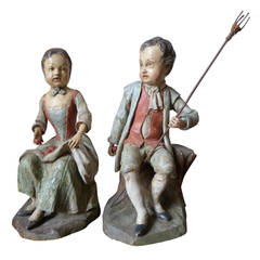 Pair of German Peasant Couple Sculptures or Carvings