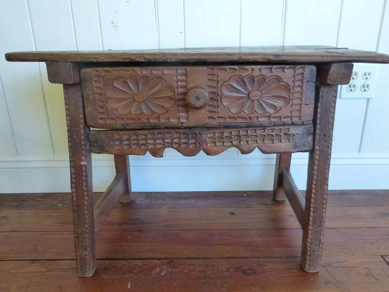 An 18th century Spanish or Spanish Colonial low table with carved drawer, circa 1770.