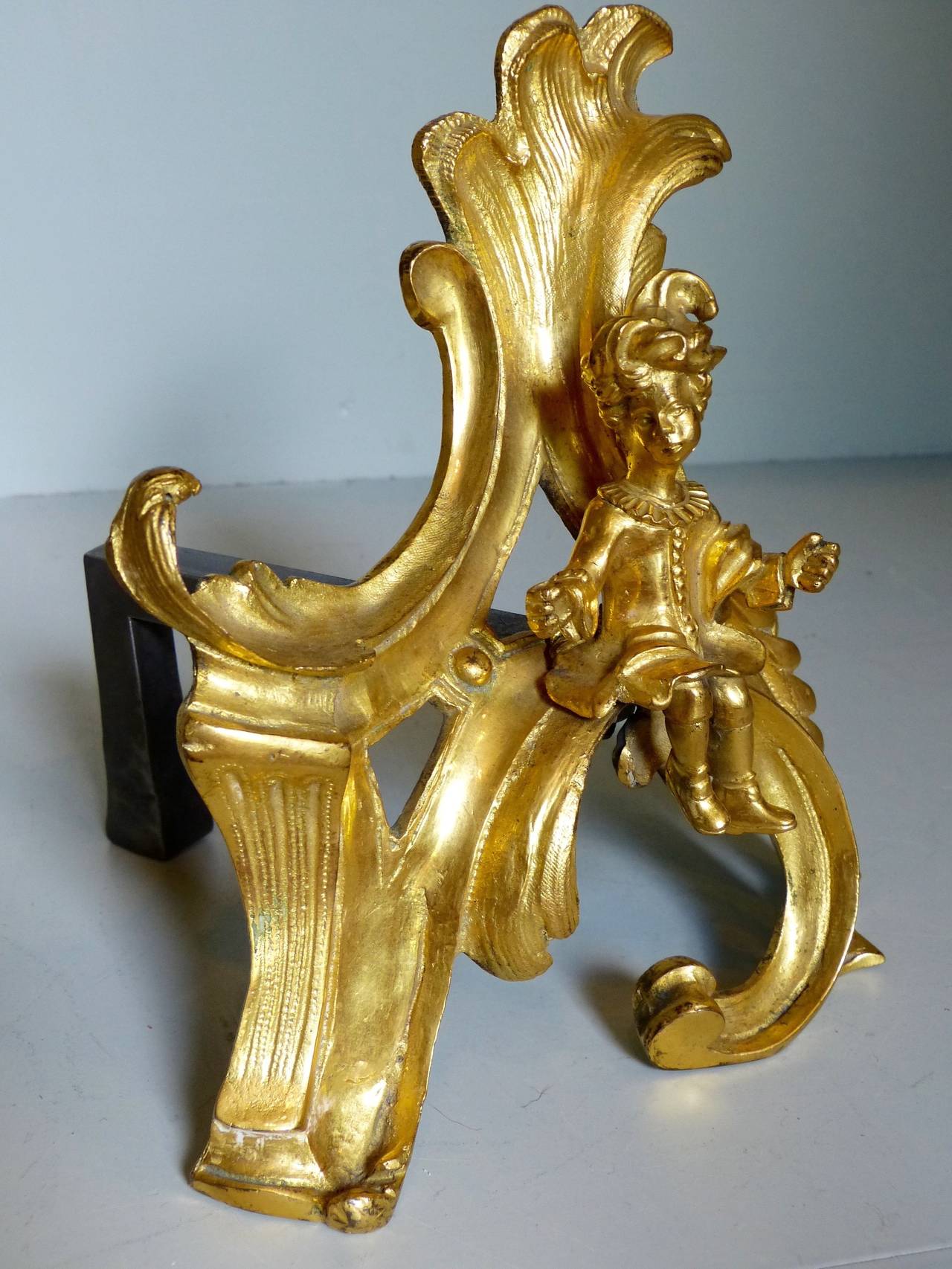 A fine quality pair of Regence period ormolu (gilt bronze) chenets, mercury gilding, circa 1720.