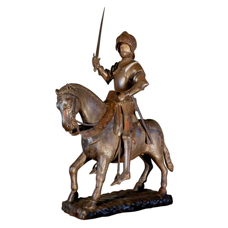 Painted and carved sculpture of "Joan of Arc in full armor on horseback