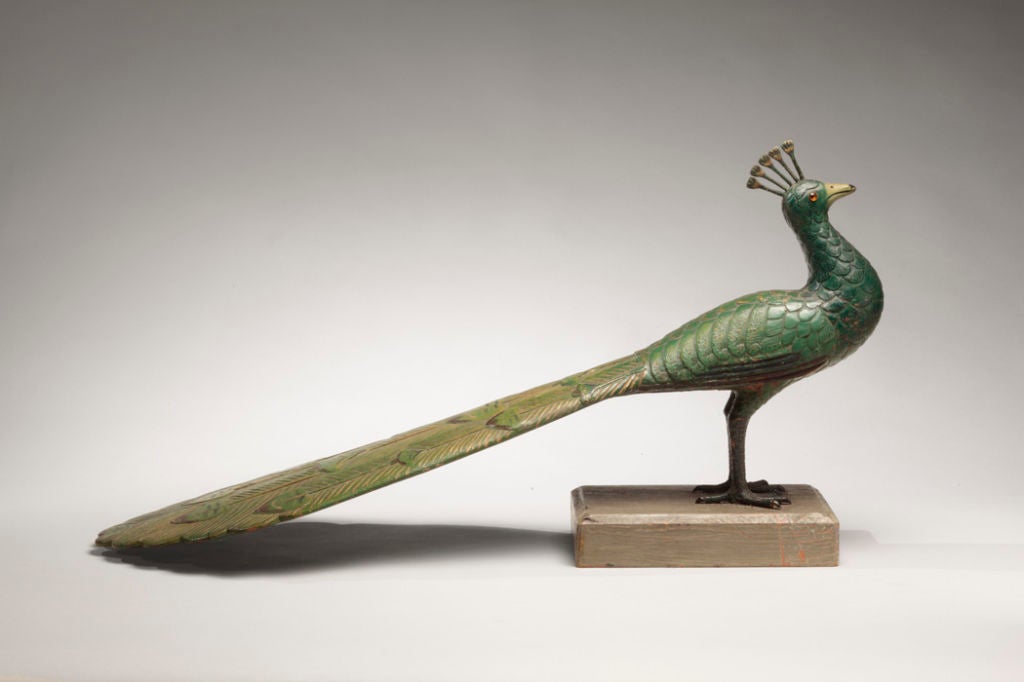 A similar figure of peacock standing on a book is illustrated in Herbert W. Hemphill, Jr., Ed., Folk Sculpture USA (Brooklyn, 1976), p. 18, and Roger Ricco and Frank Maresca , American Primitive, Discoveries in Folk Sculpture (New York, 1988), p.