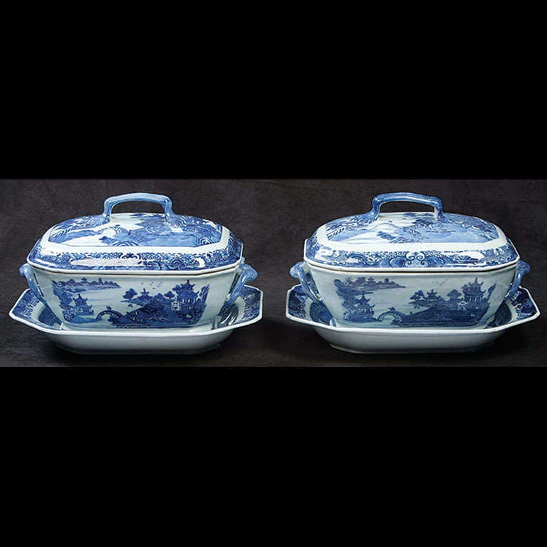 Composed of Undertray, Unusual Square Strap Handled Cover with Strap Side Handles on Cut-Corner Rectangular Bowl.  Overall Blue and White Decoration in Nanking Landscape  Motif of Houses on the Shore Connected by a Bridge