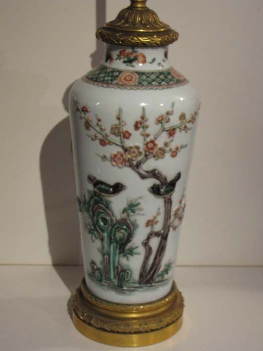 Chinese Famille Verte Vase Boldly and Exquisitely Decorated with Applied Low Relief; Rocks,Prunus Tree in Bloom and Two Songbirds All on One Side and a Spray of Chrysanthamum Flowers on the Other Side.