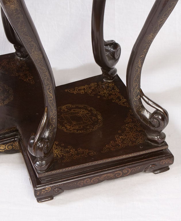 Elegant Double Square Incense Stand, with Cabriole Knee over Reverse Curve Legs Terminating in a Return Looped Queen Anne Pad<br />
Decorated, Using Gold and Red Lacquer over a Dark Brown Ground, with Lotus Flowers, Vine Meanders and Landscape