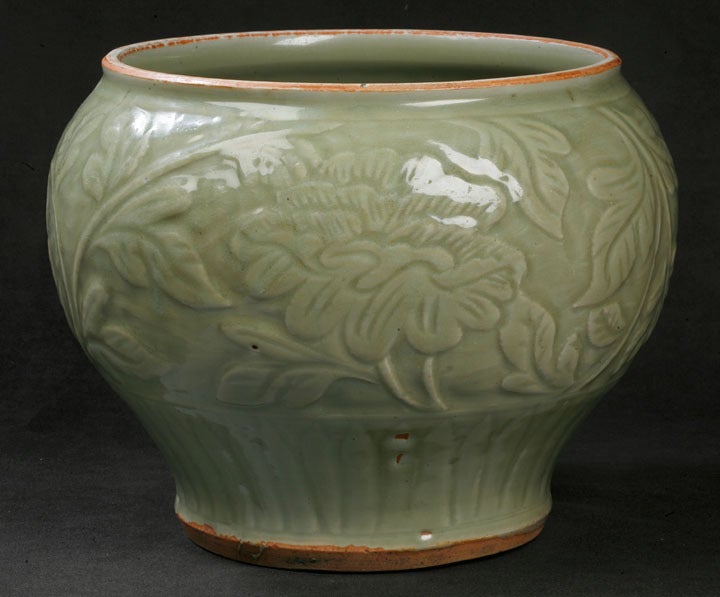 Stoutly-Potted Circular Jar Decorated with Relief-Carved Lotus Blossoms and Leafy Stems.