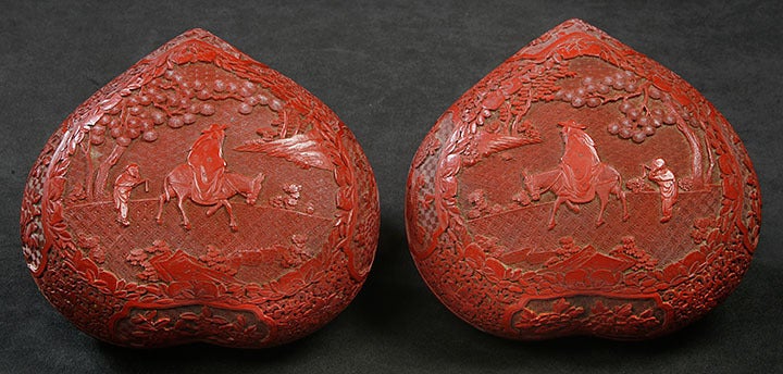 Pair of Chinese Carved Cinnabar Lacquer Peach Shaped Covered Boxes.  Depicting Carved Scene of Laozi, Founder of Daoism, on a Donkey Followed by a Young Acolyte in a Landacape Populated by Prunus Tree, Pine Tree, Rock formation and Floral Plants. 