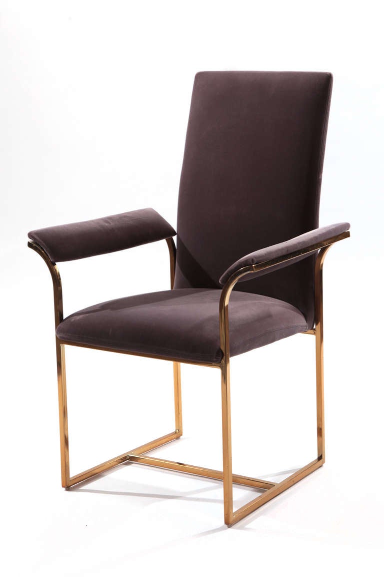 Set of 6 Milo Baughman for Thayer Coggin dining chairs circa mid 1970's. These examples are upholstered in their original lavender velvet and have subtly curved backs and wonderful brass frames. There are two arm chairs and four sides. Price listed