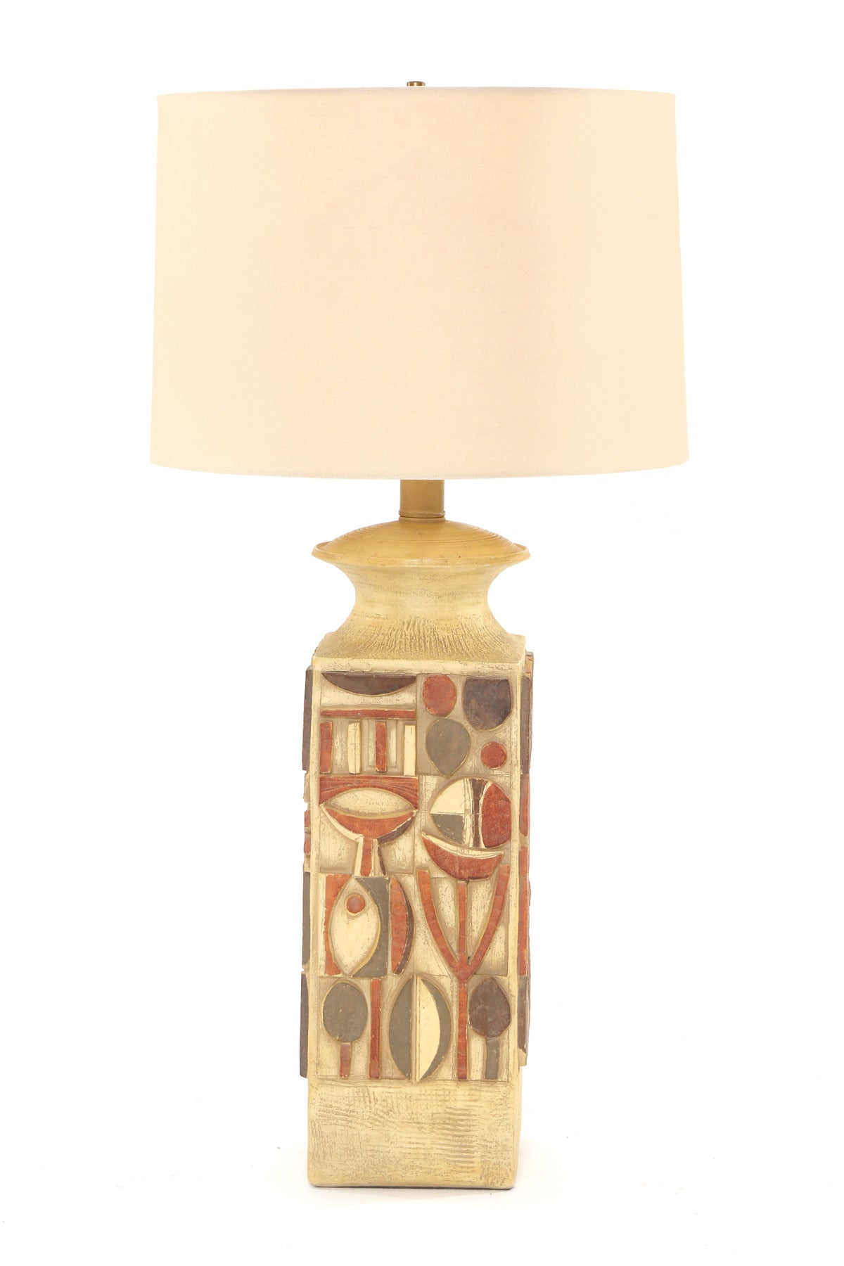 Large-scale cubist plaster table lamp, circa late 1960s. This intricate example blends earth tone glazing with fabulous forms. Price is without shade. Height listed is to the top of the socket.