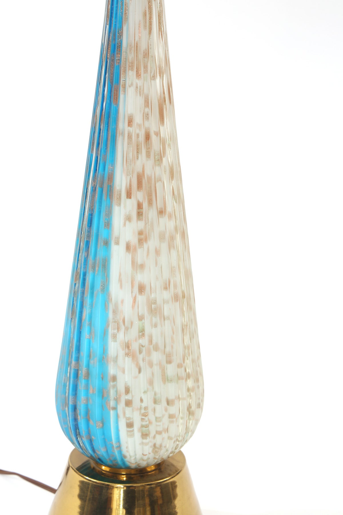 Barovier e Toso handblown Murano glass and brass large-scale table lamp, circa late 1950s. This stunning example has turquoise and clear glass with gold flecks and beautiful fluted form. Price listed is without the shade. Dimension to top of socket