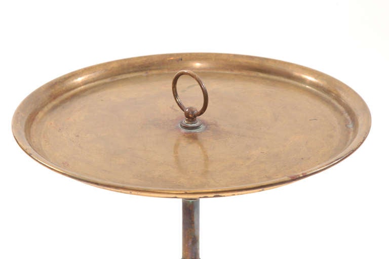 Elegant patinated brass side table from Italy circa early 1950s. This completely original example is both functional and stunning.