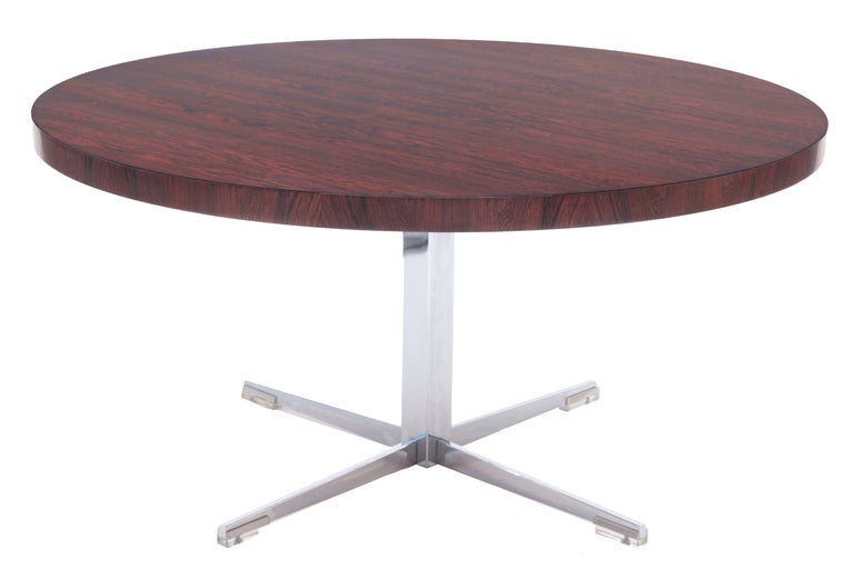 Adjustable rosewood and steel table from Germany circa early 1970's. This example adjusts from 20