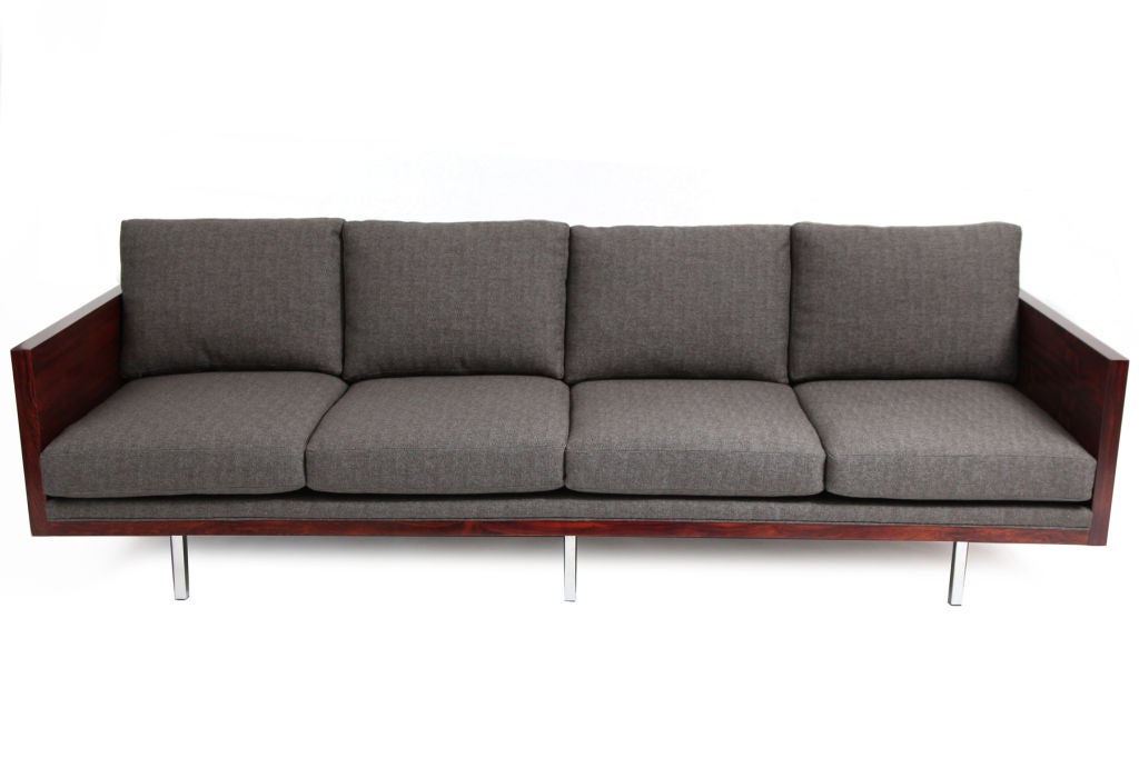 Rosewood case sofa by Milo Baughman for Thayer Coggin circa early 1970's. This example has wonderfully grained Brazilan rosewood, chrome plated steel legs and has been upholstered in a lovely charcoal gray tweed. The back cushions are down filled