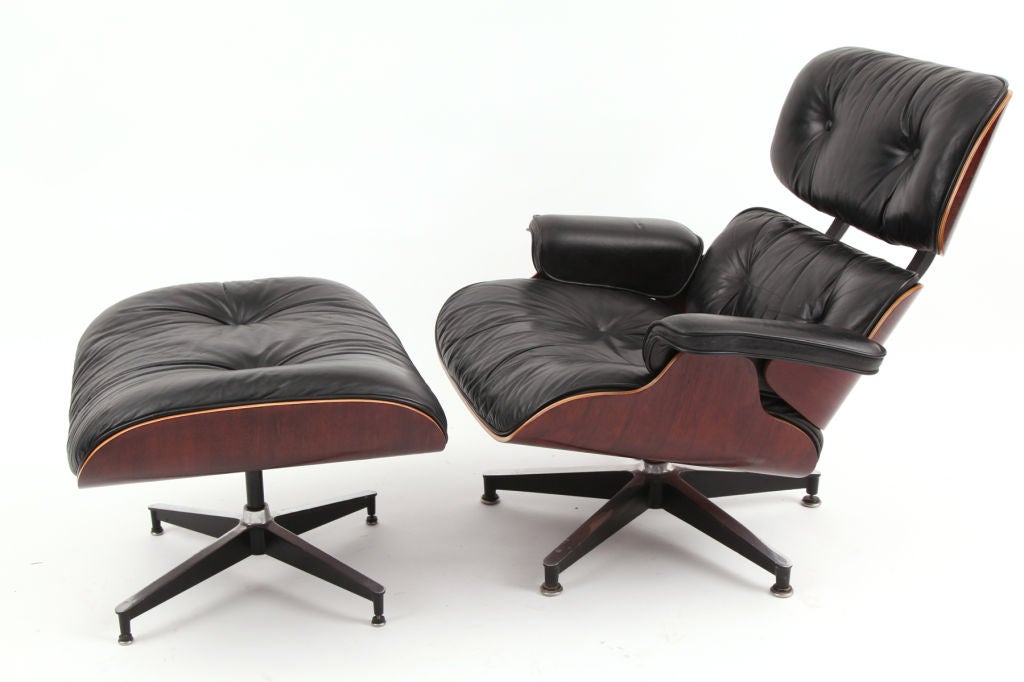 Pair of Charles and Ray Eames for Herman Miller 670 lounge chairs and ottomans. Both examples have recently been lacquered and retain their original leather.<br />
One example dates from the early 70's the other from the early 80's. There are three