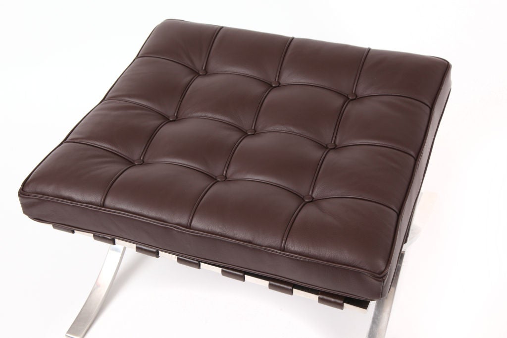 Mies Van De Rohe for Knoll Barcelona ottoman circa early 1960's. This example has a stainless steel frame and is upholstered in chocolate brown leather. Excellent restored condition.  Retains early Knolll label.