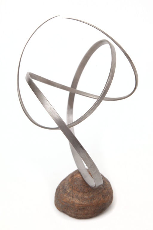 Steel and stone Kinetic sculpture, circa late 1960s. This example harmoniously blends man made and natural materials into a fabulous balanced form. Signed.