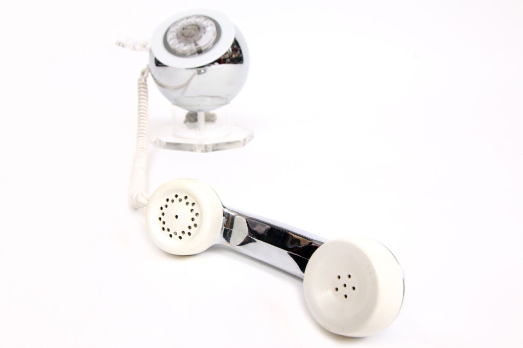 Fantastic lucite and chrome telephone circa early 1970's. This example is rotary and is perfect for your pop interior as a functional phone or great piece of sculpture.