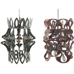 Pair of Torch Cut Patinated Steel Hanging Lights