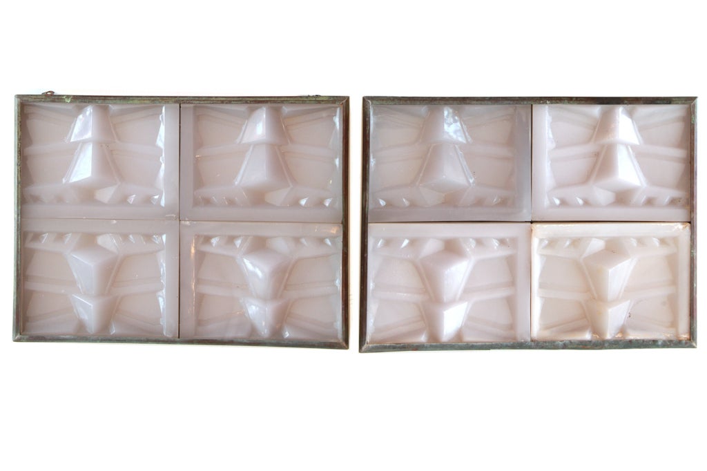 Frank Lloyd Wright for the Arizona Biltmore Hotel glass panels/sconces circa 1930's. Each panel has 4 glass inserts with the iconic Wright design. These were originally used at the Biltmore as light panels and would make wonderful sconces or