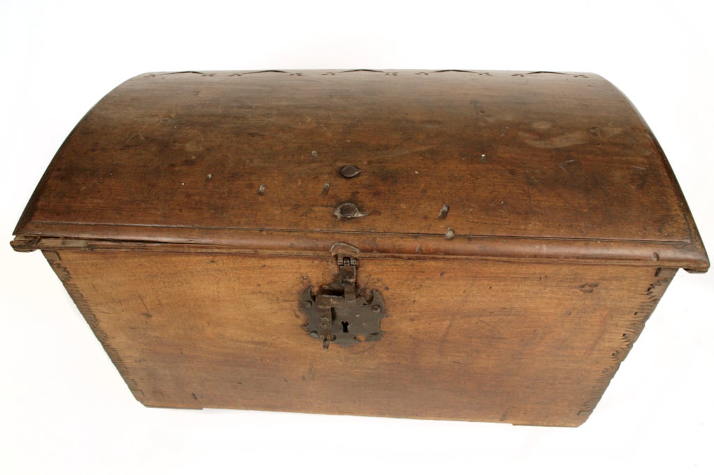 Mexican Arcon dome top trunk circa 18th century. This example is single slab construction, has phenomenal broken in patina and provenance is available.