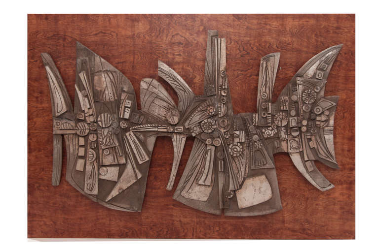 Monumental James Proctor cast aluminum wall sculpture, circa mid-1960s. This extraordinary example is solid cast aluminum mounted on walnut board. Please see our other listings for other examples of Proctors works. Aluminum: 55