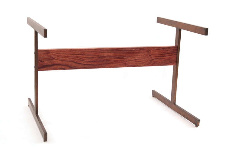 Milo Baughman I-beam dining table, circa late 1960s. This example has patinated bronze I shaped legs with an inset solid rosewood cross beam. Great as a dining table or desk. Measures: Base 44.25
