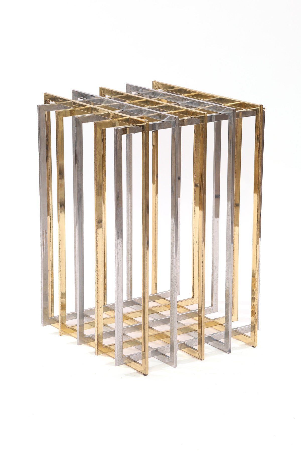 Brass and chrome dining table by Pierre Cardin, circa early 1970s. This example has alternating brass and chrome to form a grid and is shown with a 40