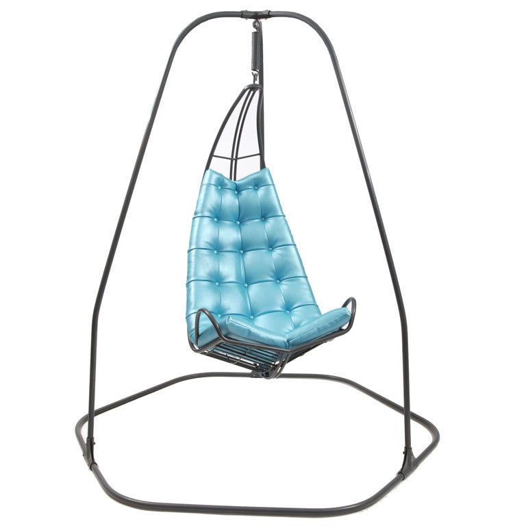 Fabulous powder coated steel and Naugahyde large scale hanging chairs, circa mid-1970s. These examples have powder coated charcoal gray steel frames and the slatted steel curved seats have been newly upholstered in a stunning powder blue. These can