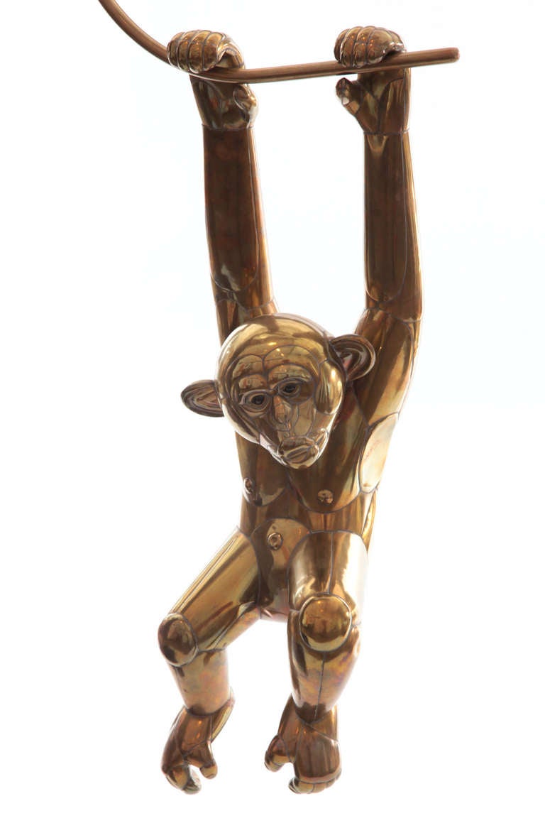 Large scale brass monkey by Sergio Bustamante circa early 1970's. This whimsical yet detailed example hangs effortlessly from its original brass branch and is signed cantas del conde 011/350. Please see Red's other listings for another equally as