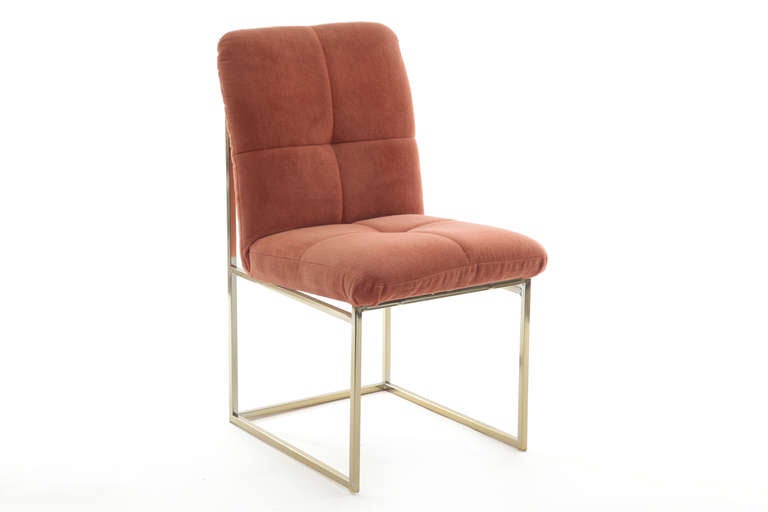 4 flat square tube brass and upholstered dining chairs by Milo Baughman circa early 1970's. These are upholstered in their original upholstery and can be easily done in the fabric or leather of your choice. Red also has 4 other of these chairs in