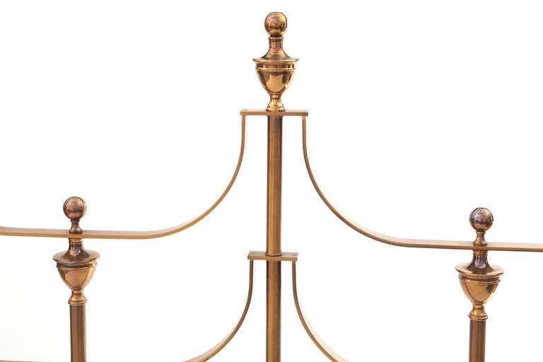 Mastercraft king size architectural headboard circa late 1960's. This all original example mixes satin and brighter finished brass and is in excellent condition.