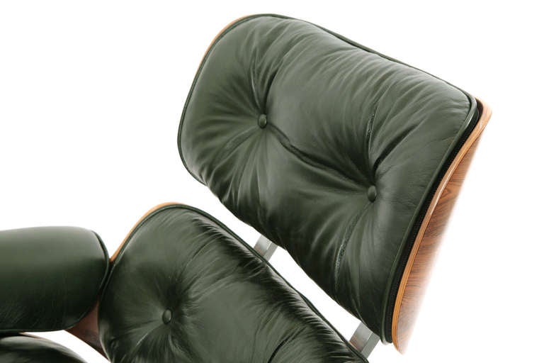 Mid-Century Modern Charles and Ray Eames Green Leather Lounge Chair and Ottoman