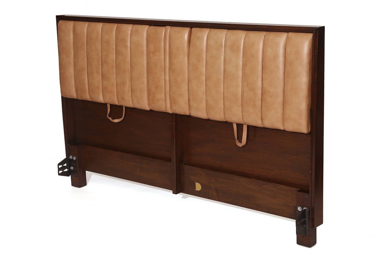 Edward Wormley for Dunbar early 1950s upholstered mahogany headboard with drop down arms and tilting back. Padded camel colored head and armrests. In very good original condition but please ask about upholstery costs should you want to change the