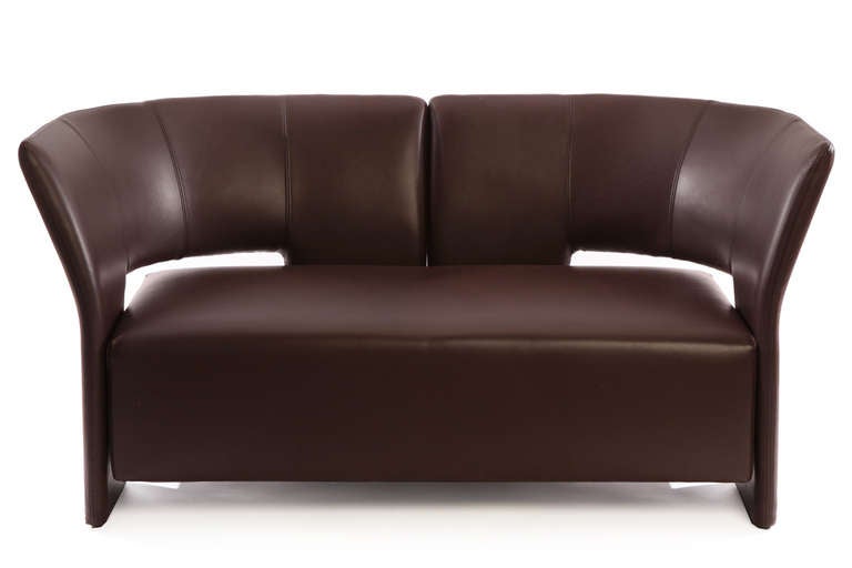 Erik Jorgensen leather 'Pelican' loveseat circa mid 1970's. This unusual example has a stunning sculptural form that has been newly upholstered in a supple chocolate brown leather. 
Looks great from all sides. Please see Red's other listings for