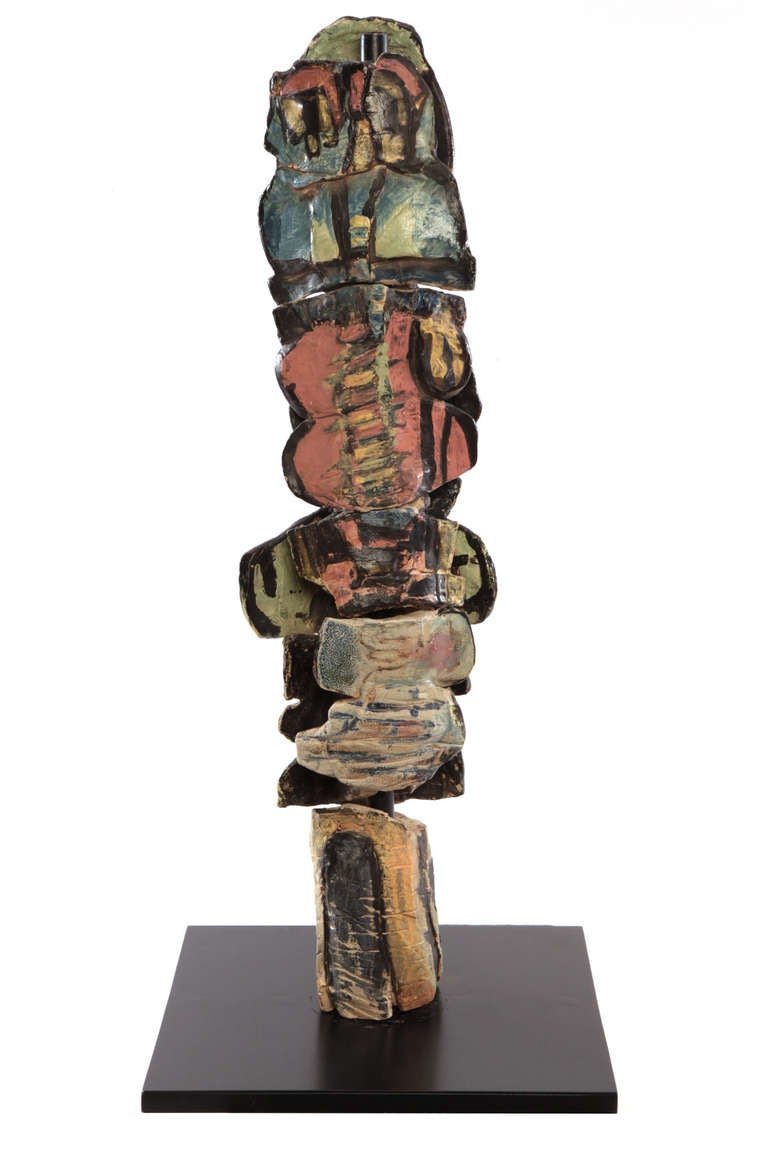 Jeanette Bernhard ceramic TOTEM, circa early 1970s. This example has five individual hand painted ceramic sections that are finished on both sides. It can be used indoors or out. Included with the sculpture is a custom steel Stand.
Measures: Base