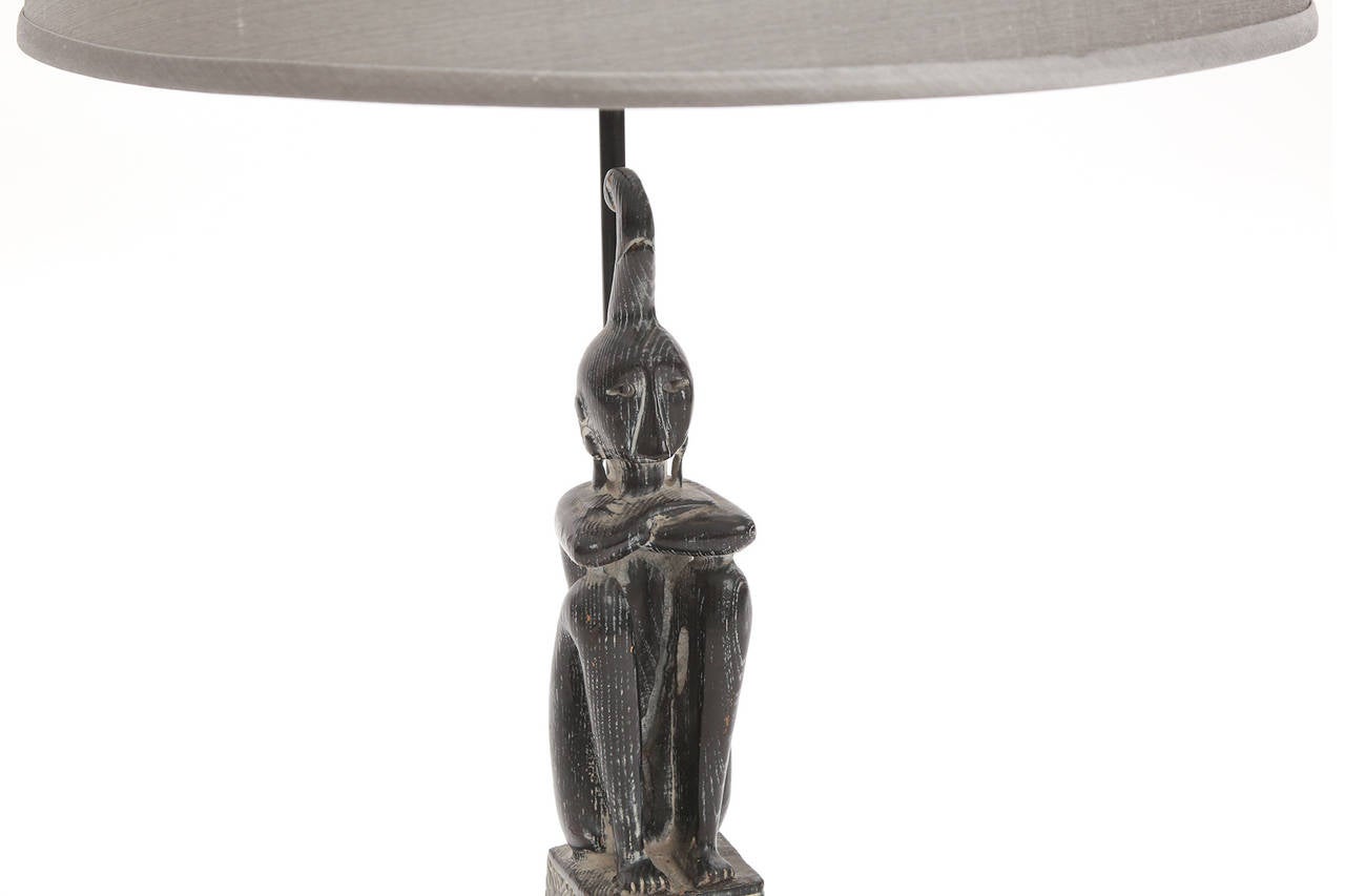 Cerused oak perched warrior lamp, circa early 1950s. This example in the manner of Samuel Marx and Paul Laszlo is sold with a custom gray silk shade.
Shade measures 11.5