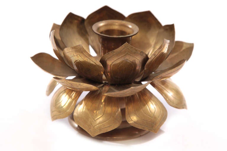 Pair of patinated brass lotus candle holders circa early 1970's. These all original examples are wonderful accent pieces and priced for the pair. Please see Red's other listings for the accompanying hanging lights.
