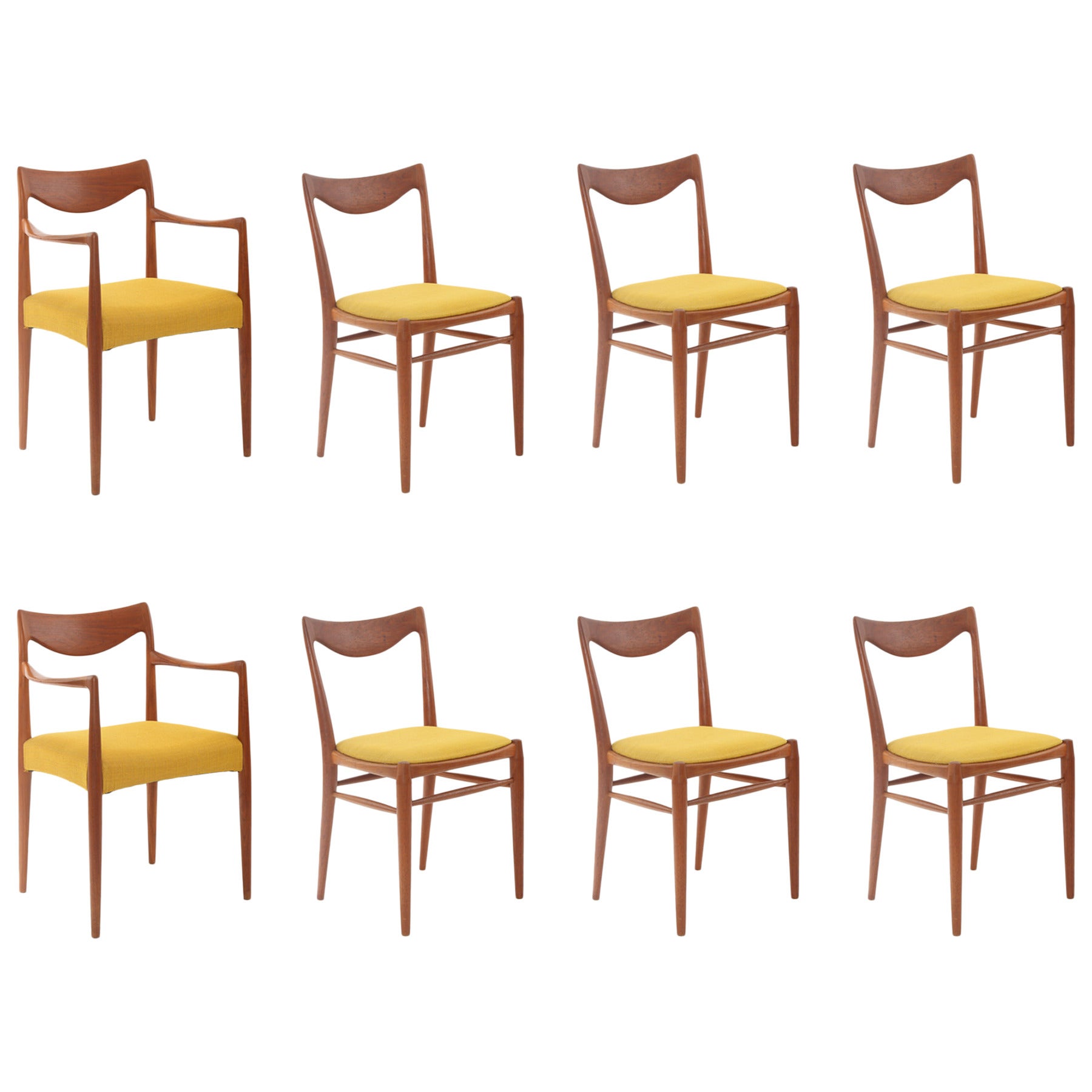 Eight Rastad and Relling Sculpted Teak Dining Chairs