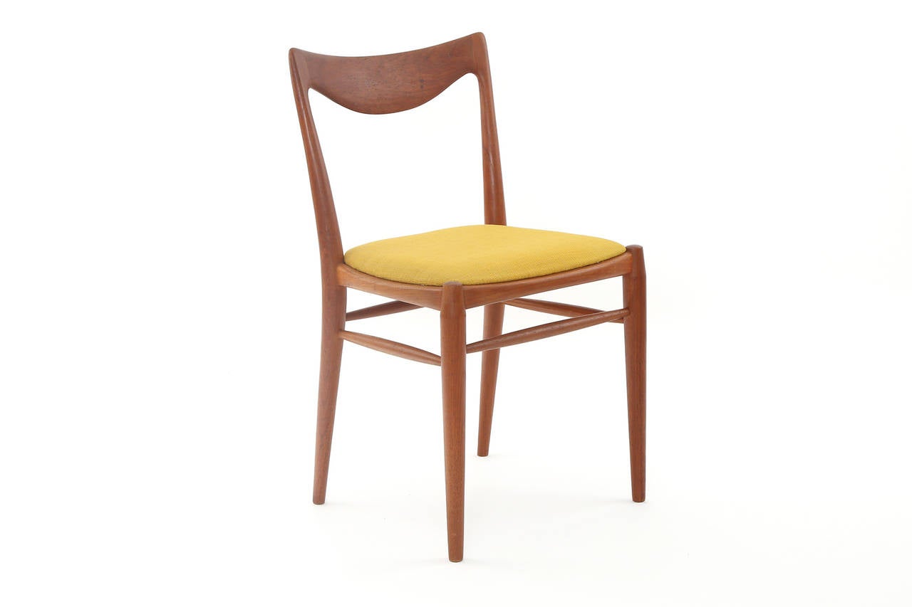 Eight Rastad and Relling Sculpted Teak Dining Chairs 2
