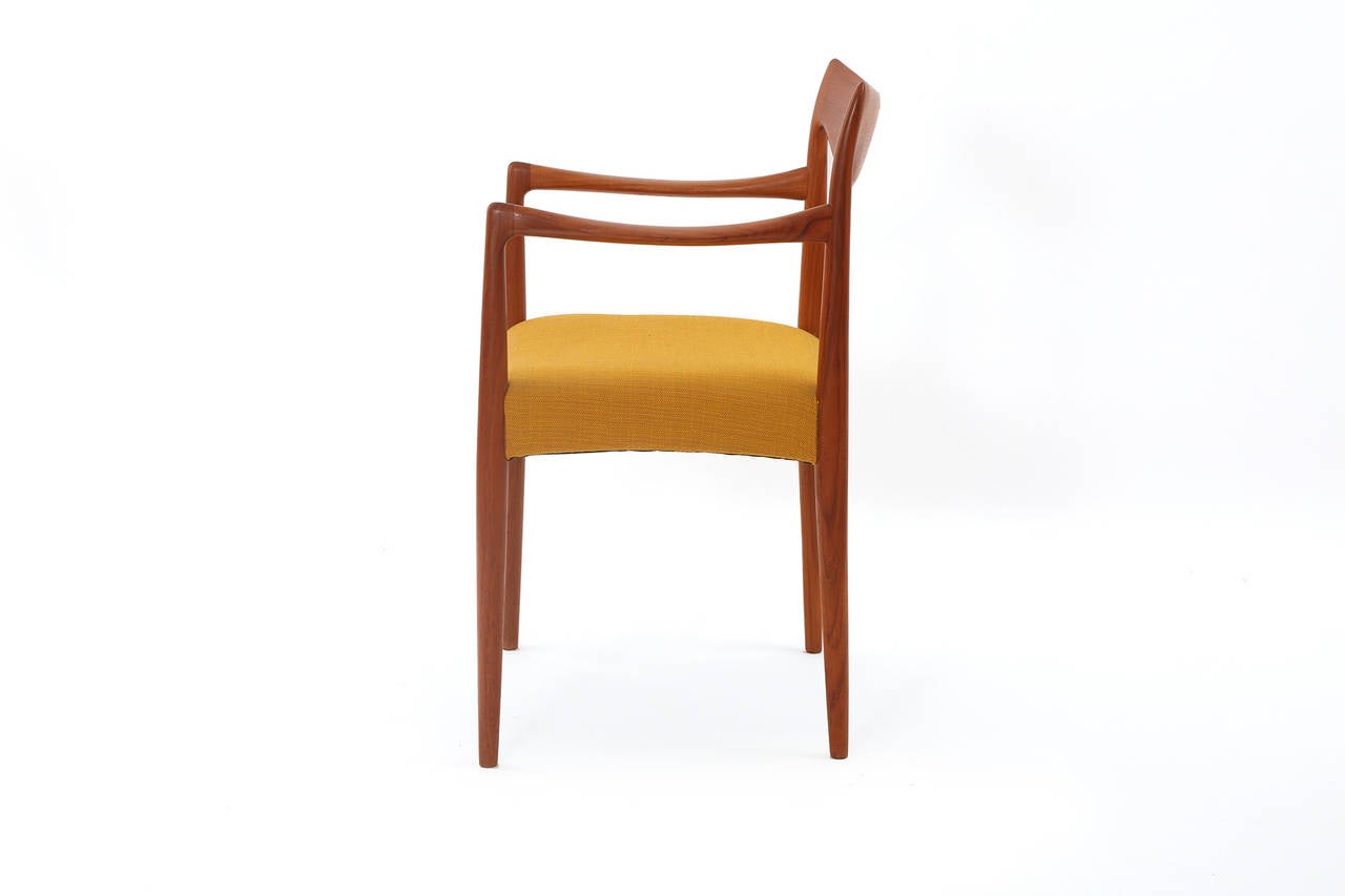 Mid-Century Modern Eight Rastad and Relling Sculpted Teak Dining Chairs