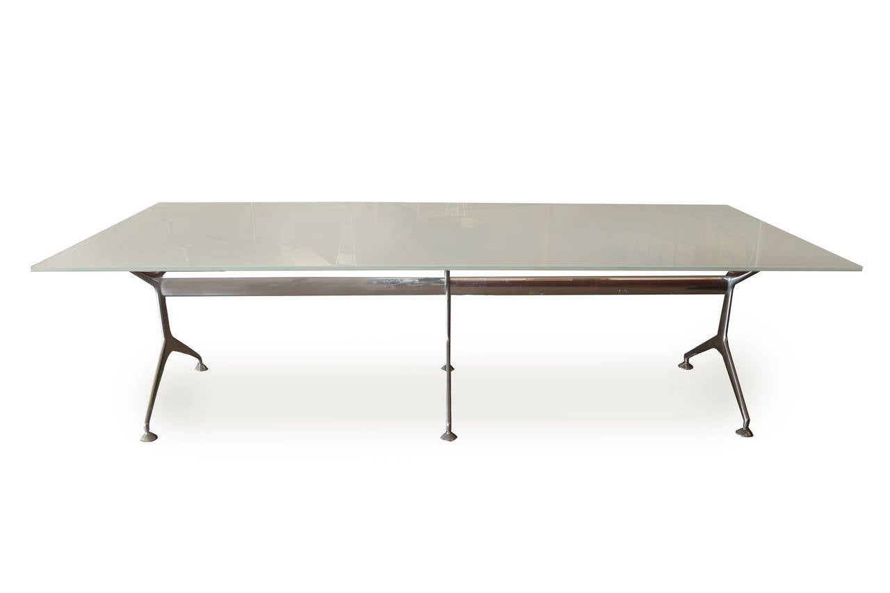 Stunning Alberto Meda polished aluminum and sandwich glass dining or conference table. This example has a two-tone sandwich glass top with hard to find triple polished aluminum base. Excellent original condition.