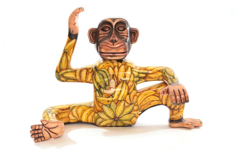 Lifesize hand-painted monkey sculpture by Sergio Bustamante circa early 1970s. This incredible work of art is solid wood and measures 4 feet across. It is stunning from all angles.