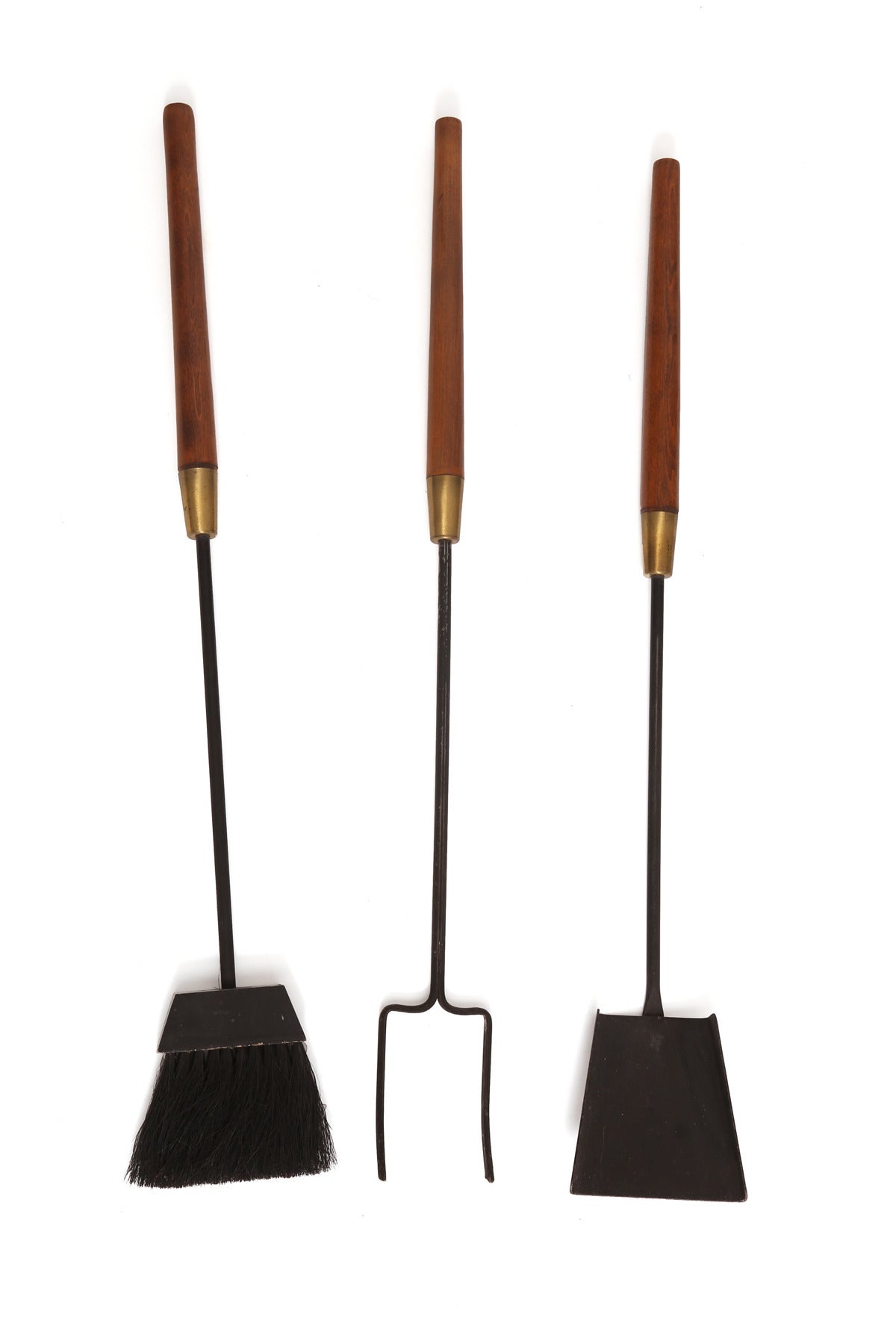 Walnut iron and brass fireplace tools, circa late 1950s. These all original examples have solid walnut handles with brass accents and iron stems and holder.  Till the end of 2015, Red Modern Furniture is offering free shipping within the United