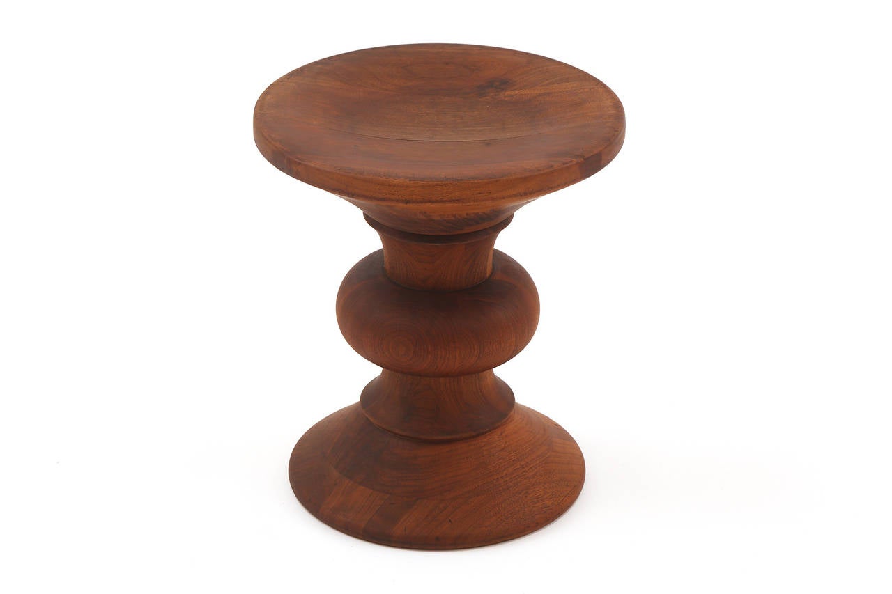 Charles and Ray Eames for Herman Miller time life stool, circa early 1960s. This all original example is hand-turned solid walnut and is early production.